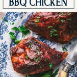 Close overhead shot of a plate of oven bbq chicken breast with text title box at top