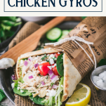 Side shot of chicken gyro on a plate with text title box at top