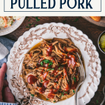 Overhead shot of a bowl of slow cooker pulled pork with text title box at top