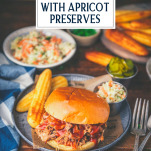 Pulled pork sandwich on a plate with text title overlay