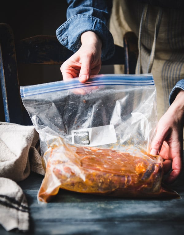 Marinating beef tenderloin in a large ziploc bag