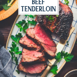 Platter of grilled beef tenderloin with text title overlay