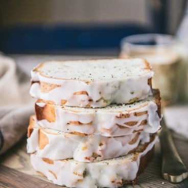 Side shot of stacked slices of poppy seed pound cake