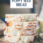 Close up side shot of stacked slices of poppy seed bread with text title overlay