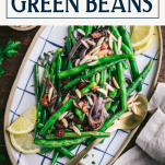 Overhead shot of a plate of oven roasted green beans with text title box at top