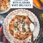 Overhead shot of a bowl of slow cooker pulled pork with white bbq sauce and text title overlay