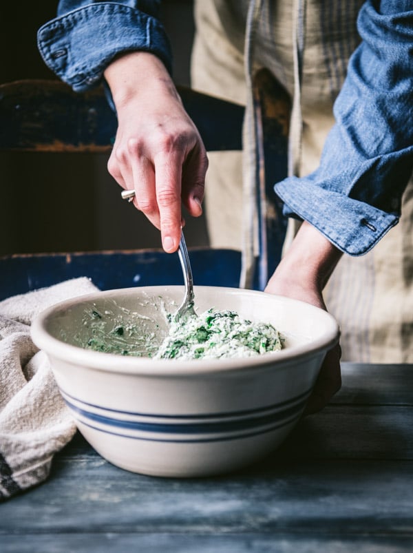 Spinach and ricotta mixture in a bowl.