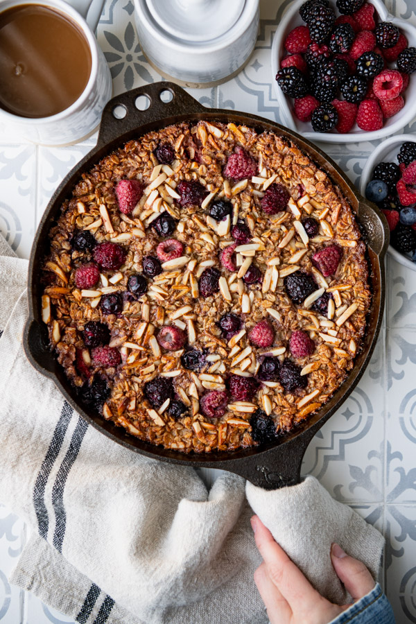 Overhead shot of baked oatmeal in a cast iron skillet