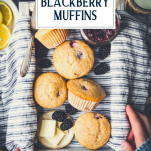 Overhead shot of a wooden box of the best blackberry muffin recipe with text title overlay