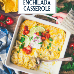 Hands holding a dish of creamy white chicken enchilada casserole with text title overlay