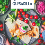 Hands holding a plate with the best chicken quesadilla and text title box at top.