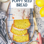 Overhead shot of a sliced loaf of lemon poppy seed bread with text title overlay
