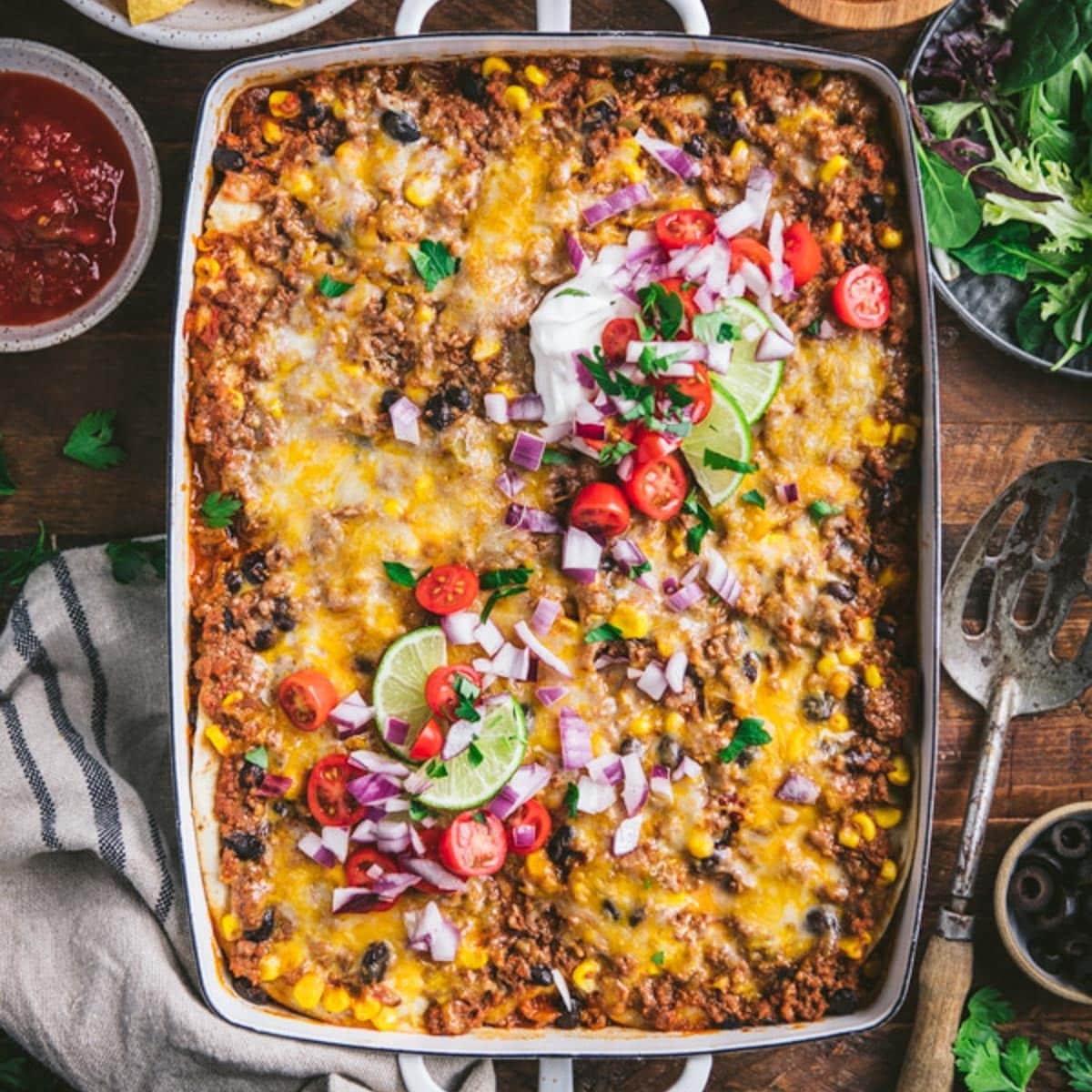 Square overhead shot of a pan of mexican lasagna