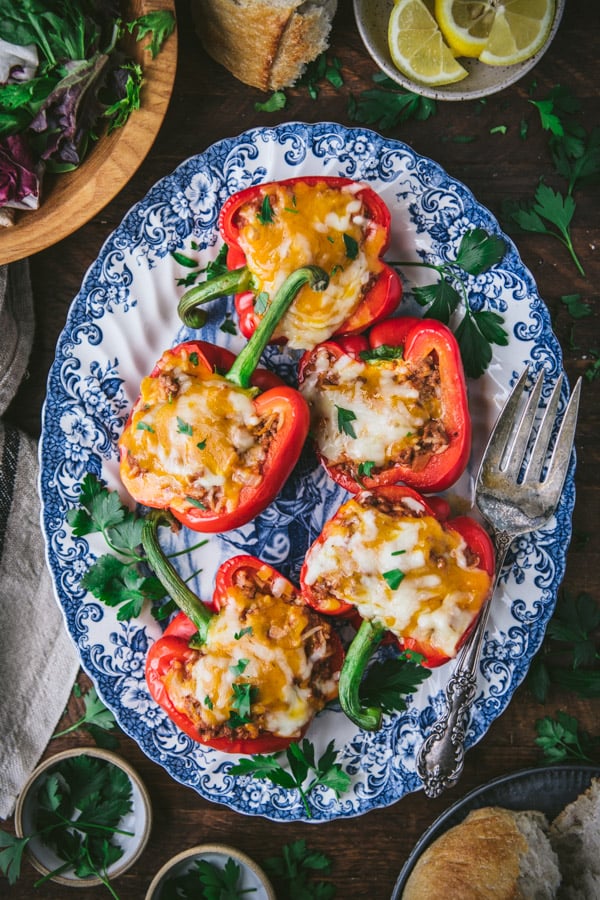 Blue and white plate with the best stuffed bell peppers recipe