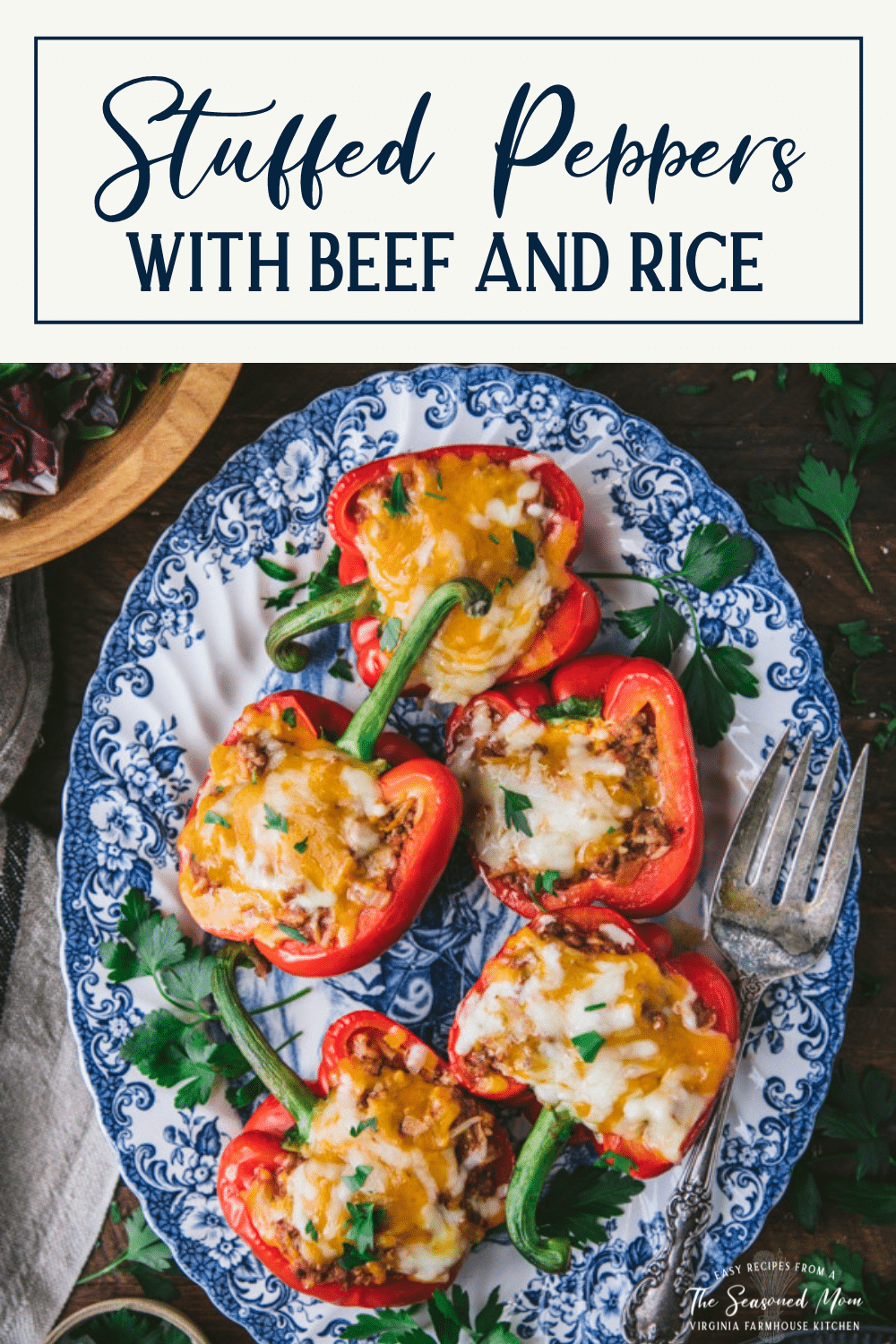 Blue and white plate of stuffed bell peppers with text title box at top