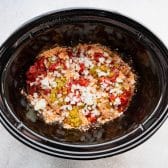Process shot showing how to make Mexican chicken in the slow cooker.