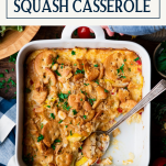 Overhead shot of hands holding a summer squash casserole with text title box at top