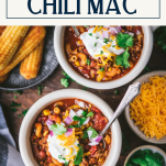 Two bowls of chili mac with text title box at top