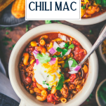 Close overhead shot of a bowl of chili mac with text title overlay