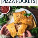 Overhead shot of hands opening a pizza pocket with text title box at top