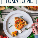 Overhead shot of hands eating a slice of tomato pie with text title box at top