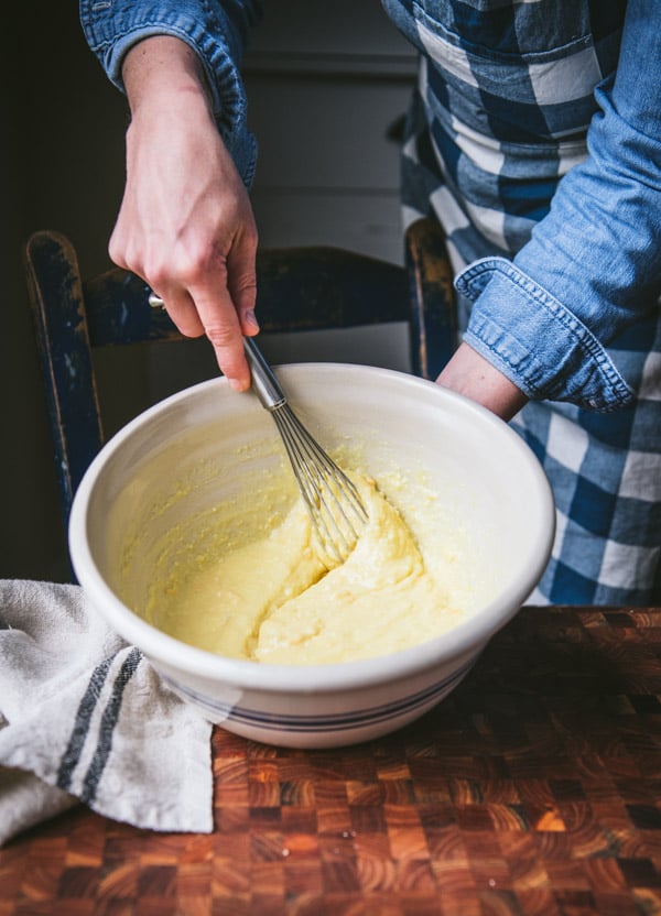 Whisking together Bisquick and cheese