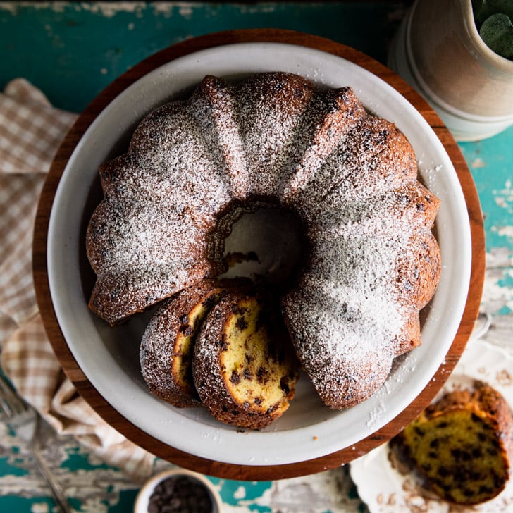 Square overhead shot of a chocolate chip bundt cake with powdered sugar