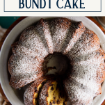 Overhead shot of sliced chocolate chip bundt cake with text title box at top