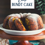 Sliced chocolate chip bundt cake on a stand with text title overlay