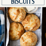 Close overhead shot of buttermilk drop biscuits with text title box at top