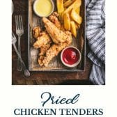 Pan of fried chicken tenders recipe with text title at the bottom