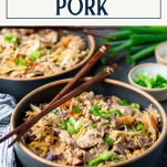 Side shot of chopsticks on a bowl of moo shu pork with text title box at top
