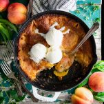 Square overhead shot of a pan of peach cobbler