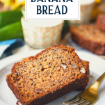 Plate of two slices of zucchini banana bread with text title overlay