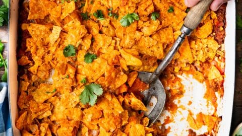 Square overhead shot of a taco bake with Doritos.