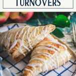 Close up side shot of a plate of apple turnovers with text title box at top
