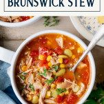 Overhead shot of a bowl of the best brunswick stew recipe with text title overlay