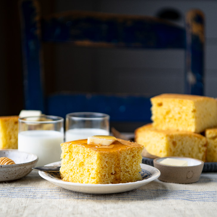 Square side shot of cornbread with cake mix on a table