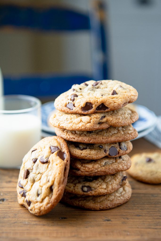 Stack of easy chocolate chip cookies on a wooden table