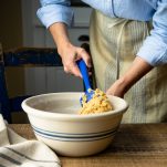 Stirring cookie dough in a bowl