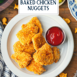 Plate of baked chicken nuggets with text title overlay