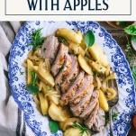 Platter of pork tenderloin with apples and text title box at top
