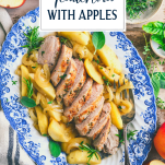 Platter of pork tenderloin with apples and text title overlay