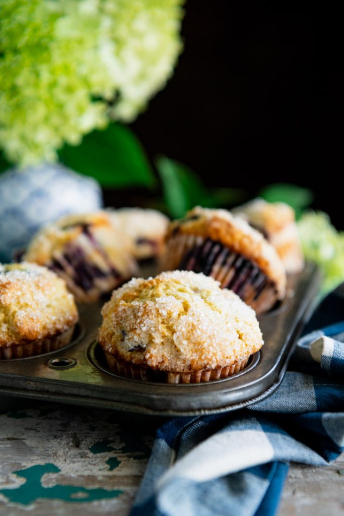 Homemade blueberry muffins in a muffin tin