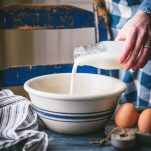 Adding buttermilk to a large bowl