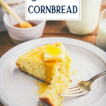 Side shot of the best southern cornbread recipe on a plate with text title overlay