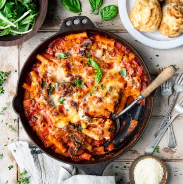 Overhead featured square image of a skillet of easy vegetable and five cheese baked ziti