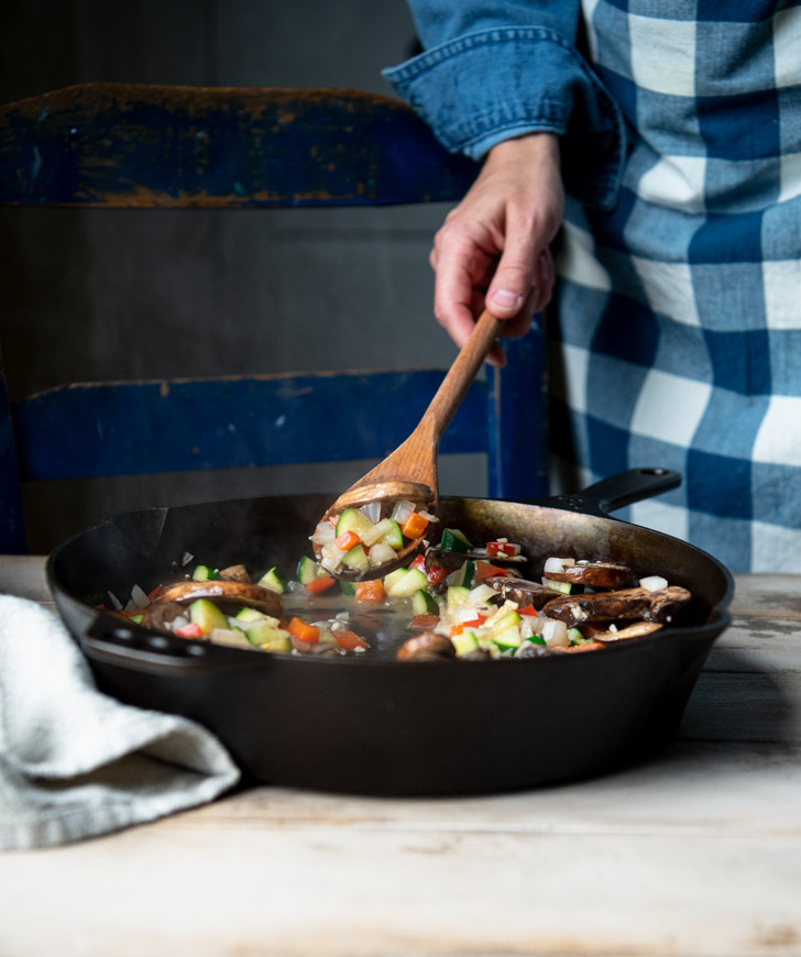 Sauteing vegetables in a skillet
