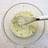 Whisking wet ingredients.
