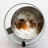 Sifting dry ingredients.